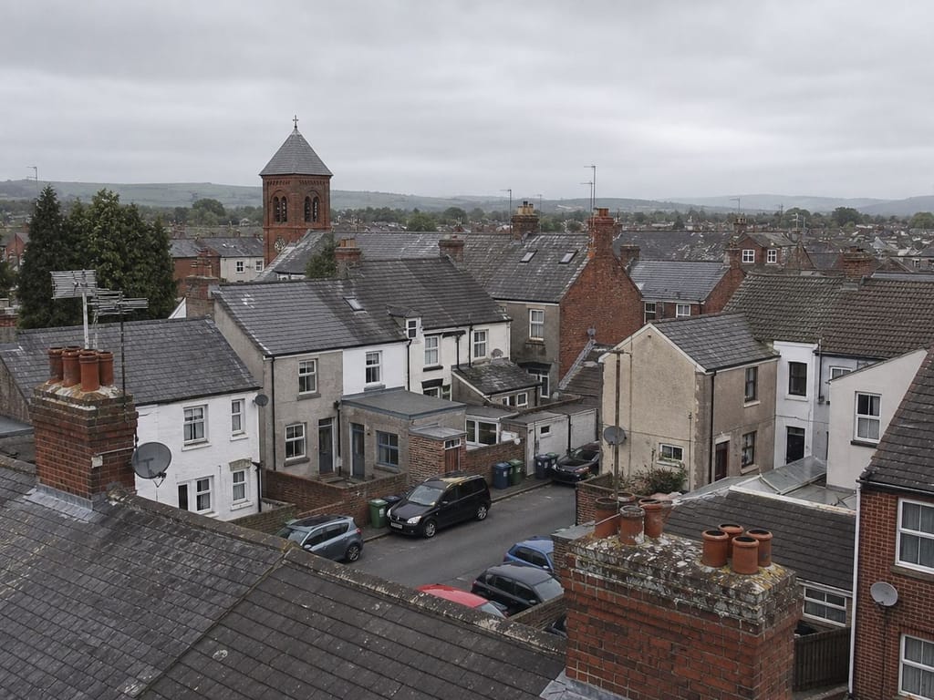 Victorian terrace row with mixed concrete tile and slate roofs